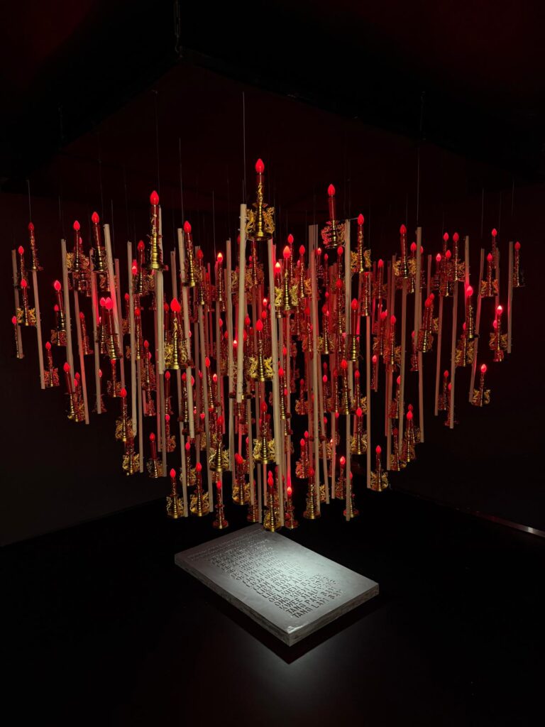 FX Harsono, The Light of Spirit (2005), plastic electric candles, LED bulbs, cast cement, wood